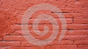 a brick wall painted in red