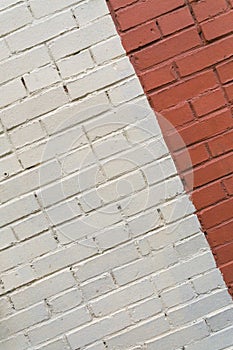 Brick wall painted white and red