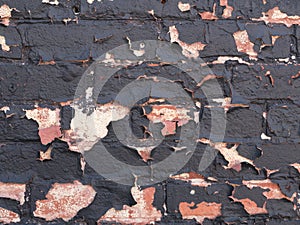 Brick wall peeling paint background or texture