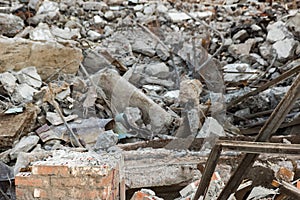 Brick wall and pieces of a dismantled building