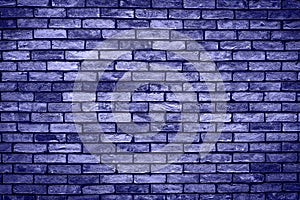 Brick wall of purple or violet masonry. Wall with small Bricks. Modern wallpaper design for web or graphic art projects