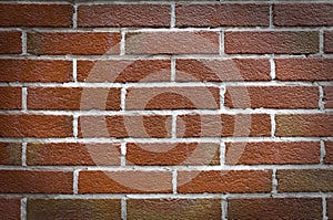 Brick wall of red color, wide panorama of masonry.