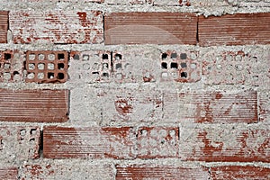 Brick wall with remaing plaster