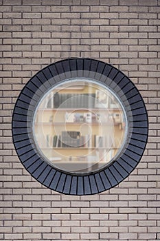 Brick wall with round window