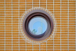 Brick wall and round window