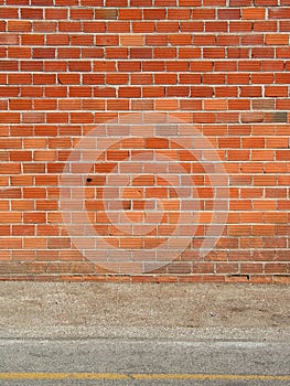 Brick wall and sidewalk