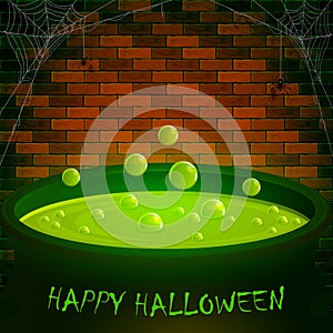 Brick wall with spiders and Halloween cauldron