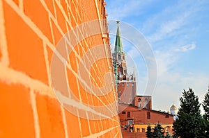 Brick wall and Troitskaya Tower of the Moscow Kremlin.