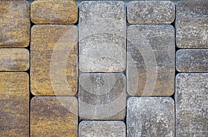 Brick wall with variegated brown bricks. Used as a background.