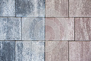 Brick wall with variegated brown bricks. Used as a background.