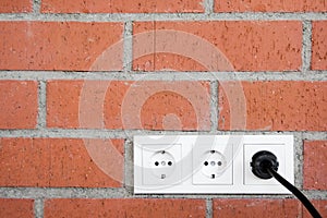 Brick Wall w/ Power Outlet