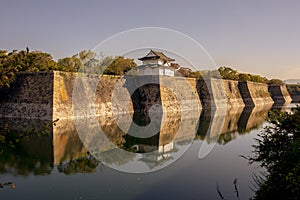 Brick wall and water pool of osaka castle boundary japan