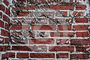 Brick wall with white putty destroyed
