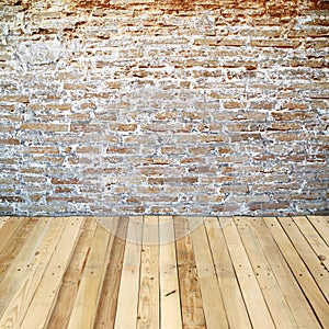 Brick wall with wooden floor