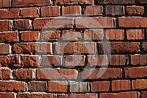 Brick walls with crumbling clay bricks, old wall bricks.