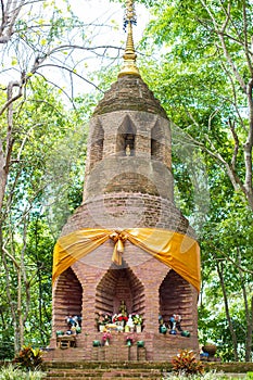 Bricked pagoda in forest