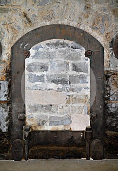 Bricked-up door in old building