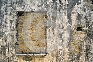 Bricked up window of an old buildin in the historical center of Naples, Italy photo
