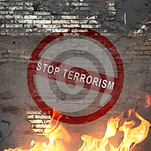 Bricked wall with stop terrorism sign
