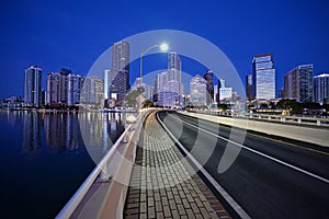 Brickell Key Bridge and City of Miami skyline in pre dawn twilight.