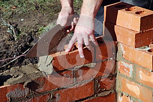 Bricklayer building wall