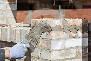 Bricklayer building wall