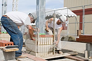Bricklayers Using Levels photo