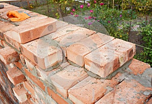 Bricklaying, Brickwork. Bricklaying on House Construction Site.