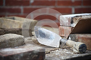 Bricklaying scene with trowel and bricks