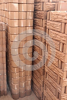 The bricks are arranged alternately to form columns.