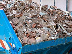 Bricks in a construction waste container