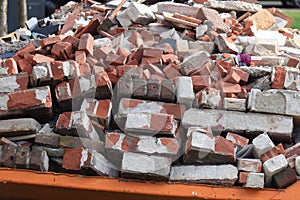 Bricks in a Garbage Dumpster