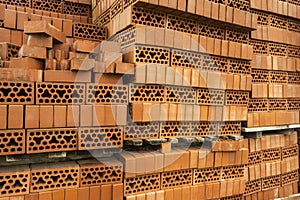 bricks with holes folded on a construction