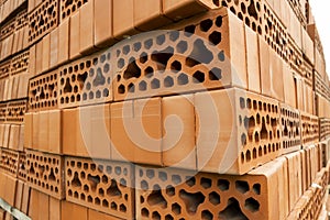 bricks with holes folded on a construction