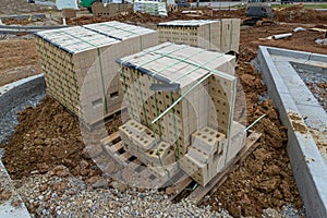 Bricks and Other Construction Materials At Commercial Building Site