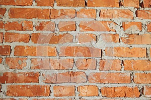 Bricks wall masonry close up with cement. Process of house building and building materials concept. Red bricks laying at