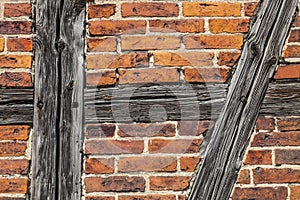 Bricks and Wood Bars of Old Wall