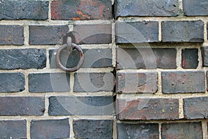 Brickwall with metal ring