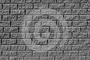 The brickwork texture. Grey wall