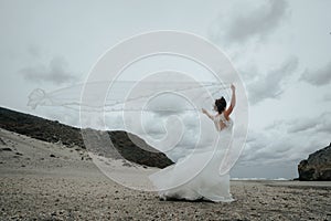 The bridal beautifully veils evolving in the wind at the coast