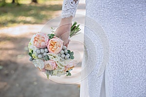 Boquet of flowers in bride hand