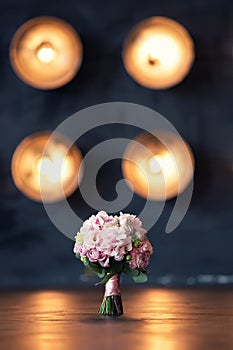 Bridal bouquet on a background of lights