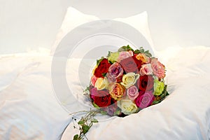 Bridal Bouquet on a bed