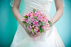 Bridal bouquet in the the bride's hands