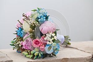 Bridal bouquet of colorful flowers and roses