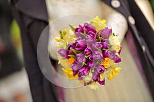 Bridal bouquet made of yellow and purple tulips