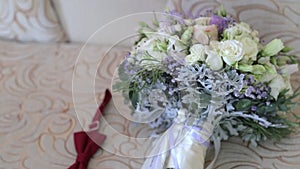 Bridal bouquet posy with rings. groom boutonniere