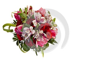 Bridal bouquet of roses, tulips and alstroemeria on white background