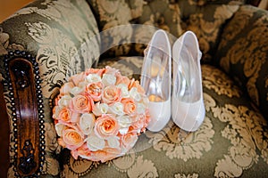 Bridal bouquet and shoes photo