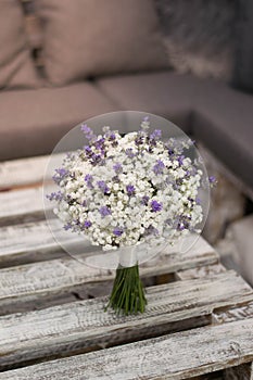 Bridal bouquet. A simple bouquet of gypsophila and lavender flowers. White wedding bouquet